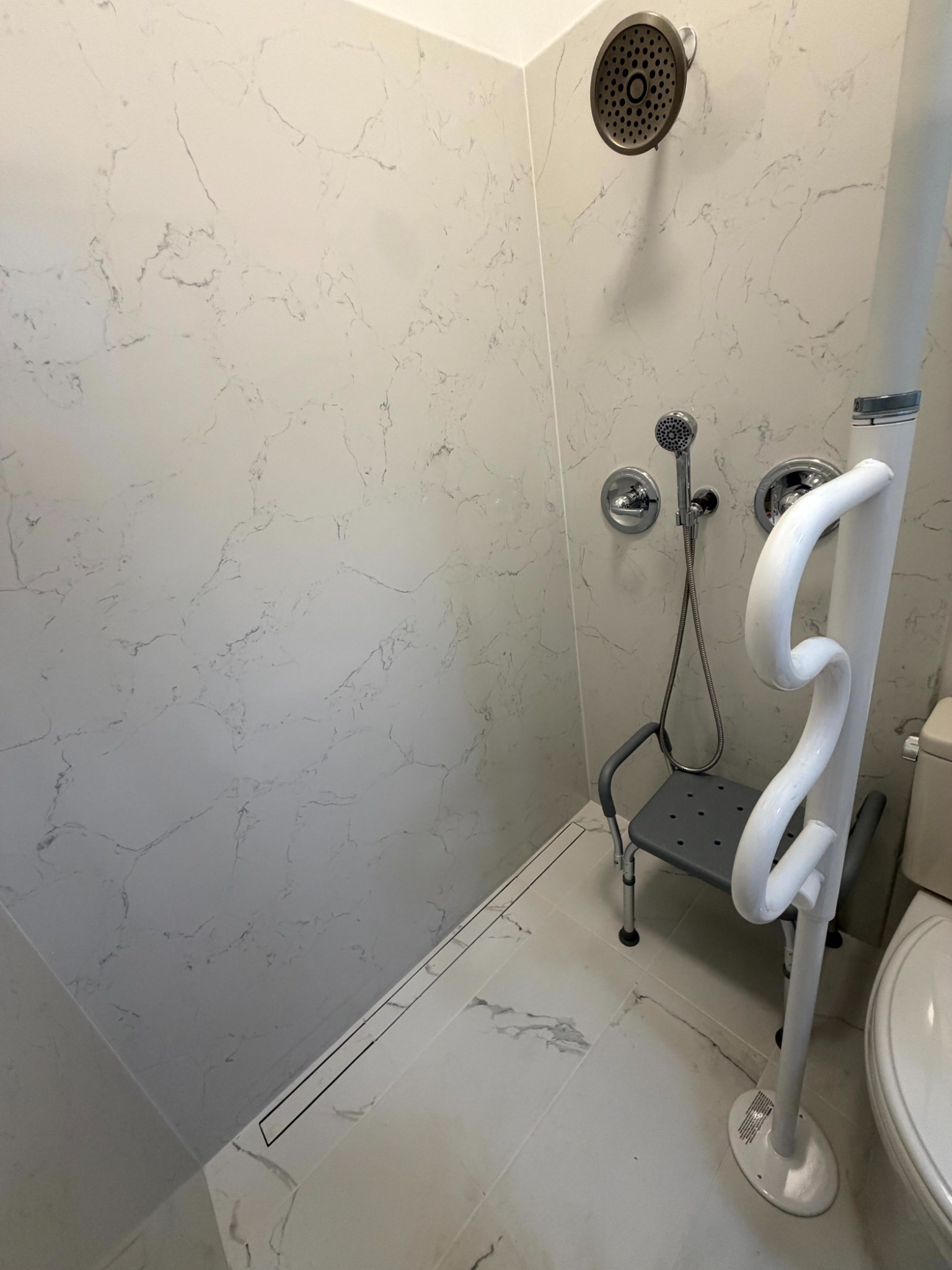 Accessible shower seating and support configuration